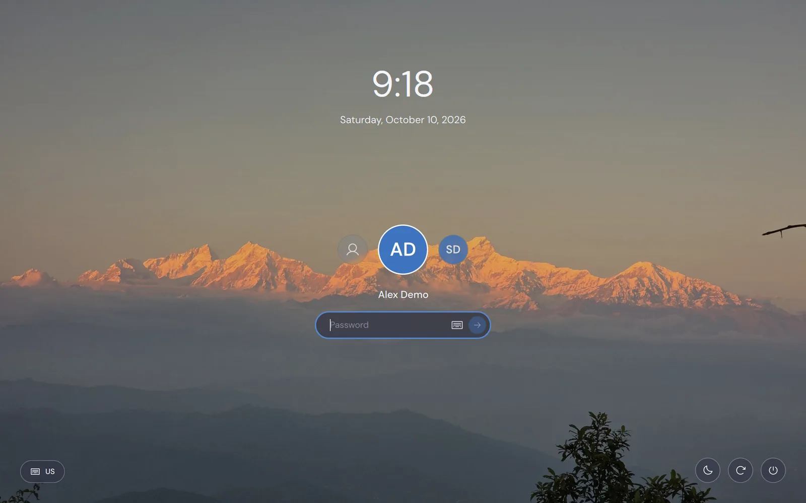The login screen in its lock-screen look: date and time at the top, the accounts and a password field in the middle, power buttons in the corners.